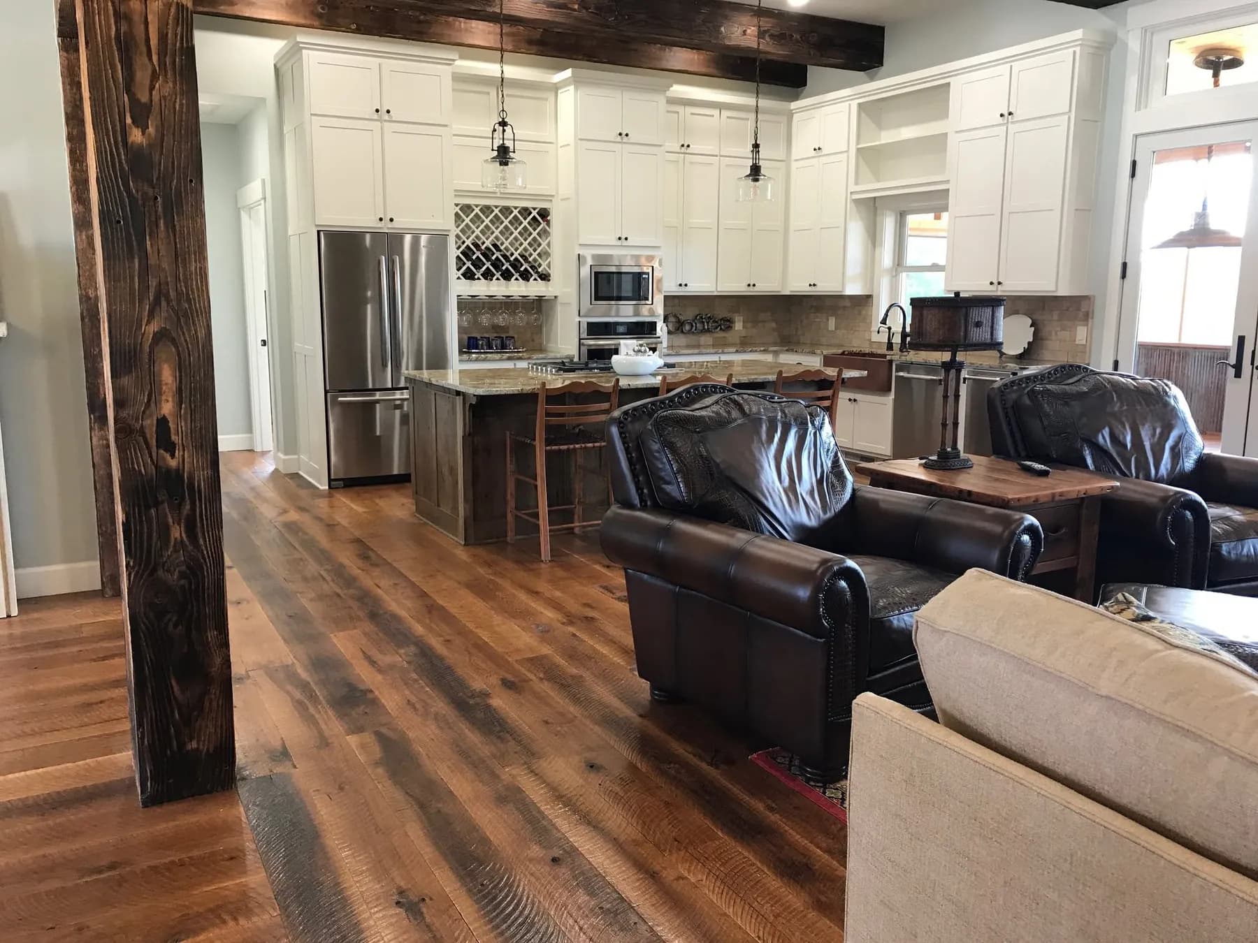 White oak dirty top floor through a kitchen and living room