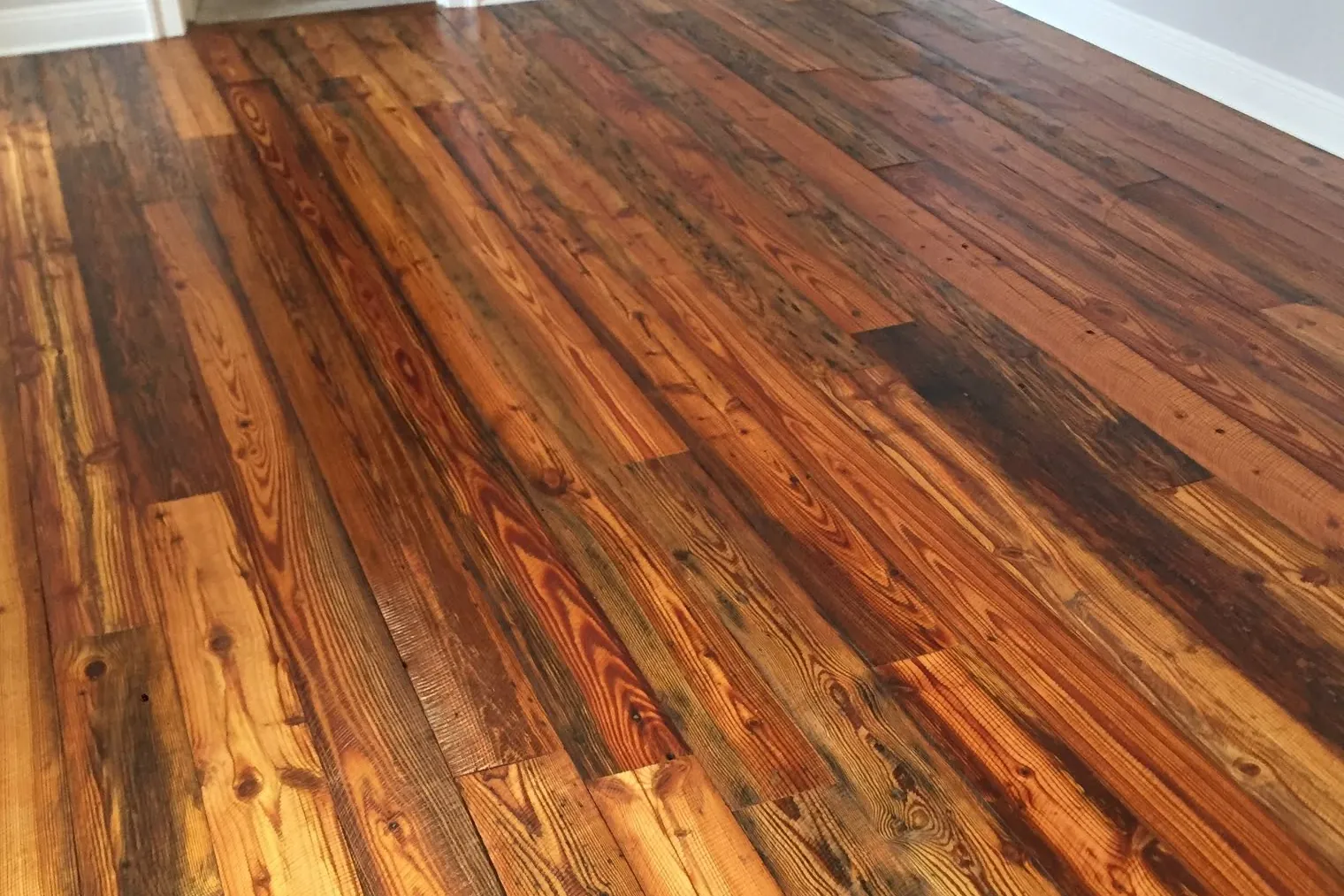 Antique Heart Pine — Old-growth longleaf pulled from 19th-century mills and factories.