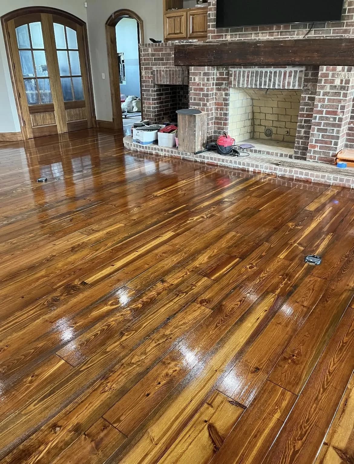 Glossy engineered pine floor with an Early American stain